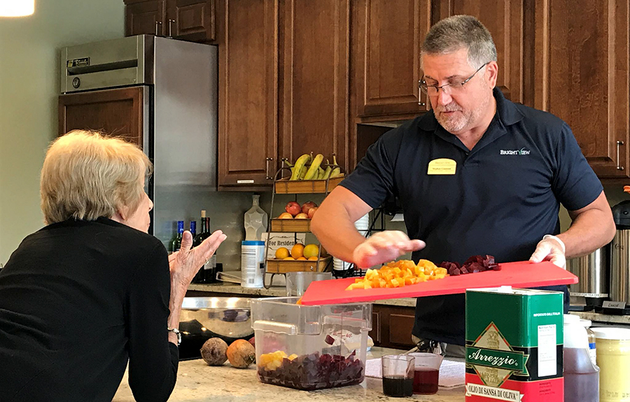 Brightview Senior Living Chef Cooking with Resident